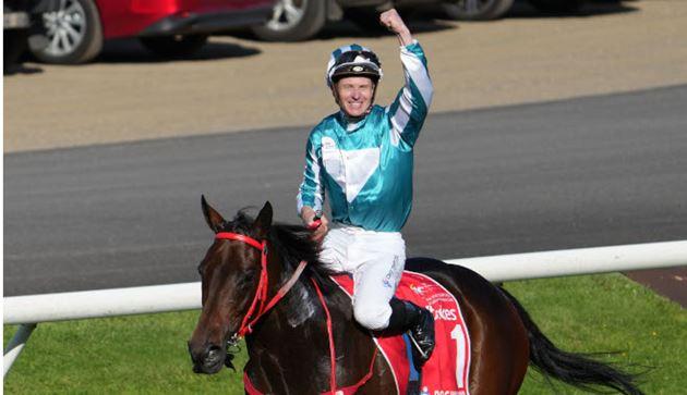 James McDonald celebrates his Cox Plate win aboard Romanic Warrior at The Valley. (Image: Racing Photos)